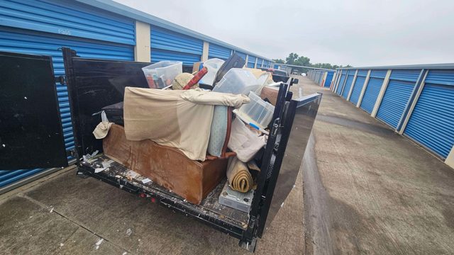Furniture loaded outside storage units