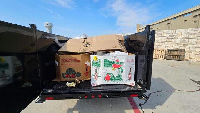 Cardboard and household junk loaded for removal