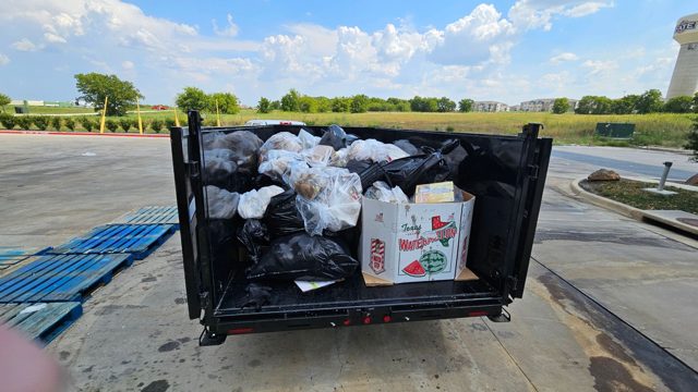 Bagged waste in the dump trailer