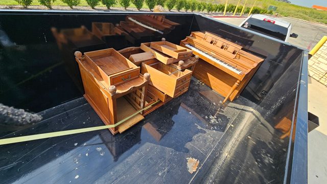 Wood furniture in the dump trailer